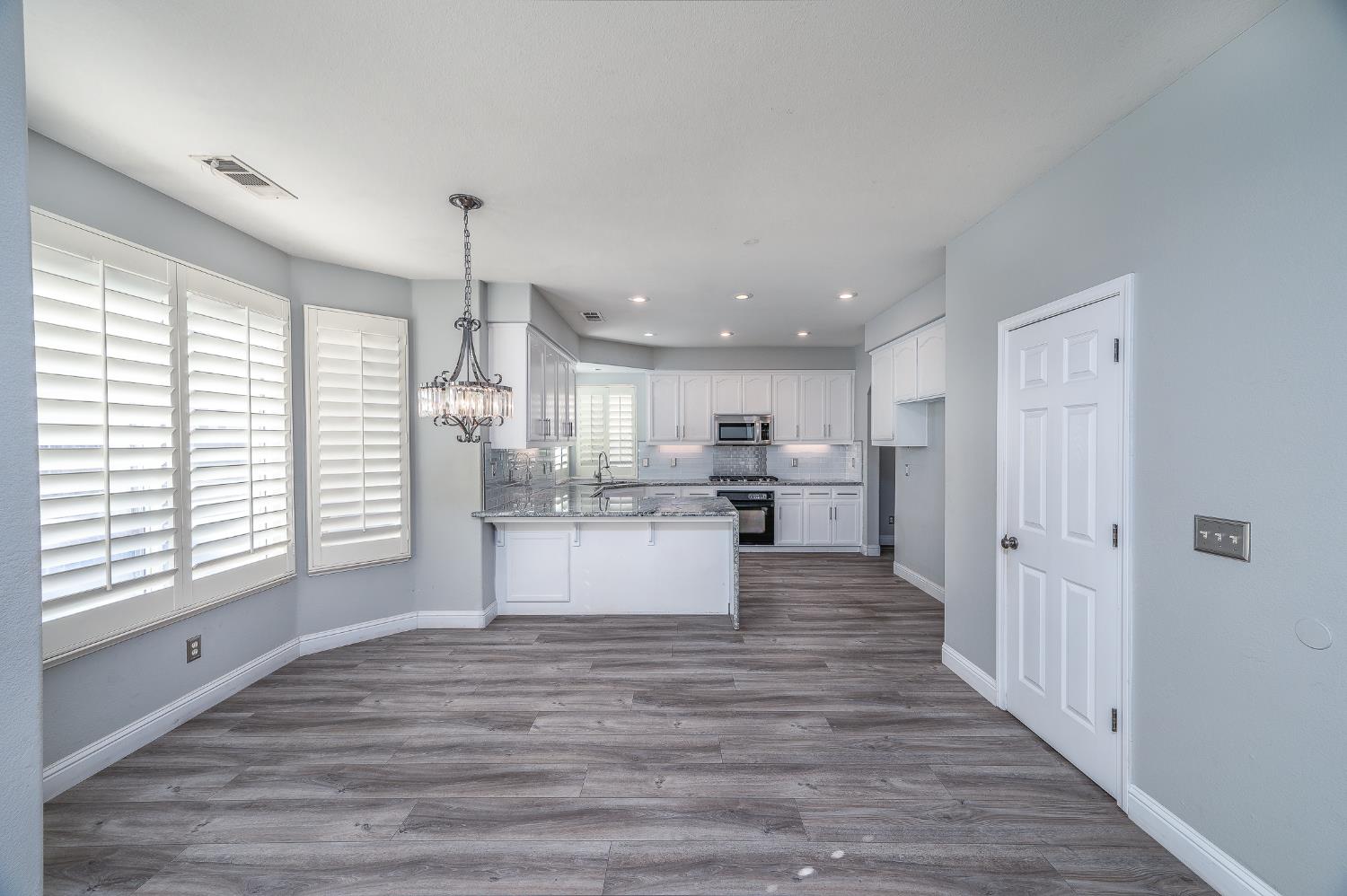 2800 Olympus Court Modesto, CA 95356 - Photo 15 of 56 a view of kitchen and kitchen with a window