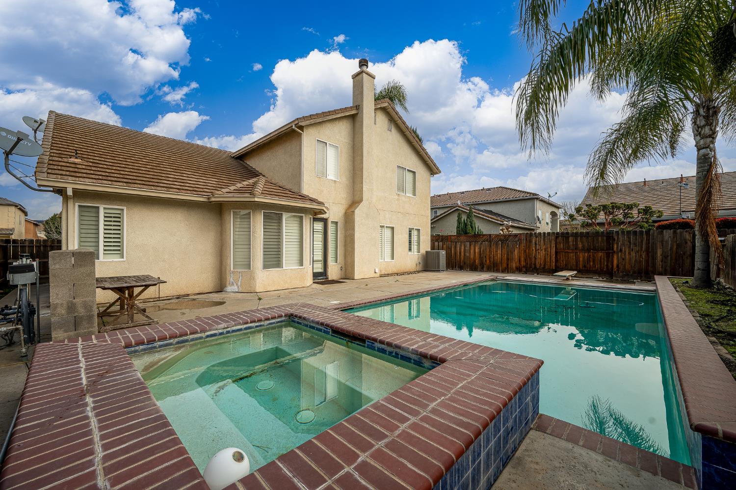 2800 Olympus Court Modesto, CA 95356 - Photo 2 of 56 a view of a house with pool and chairs