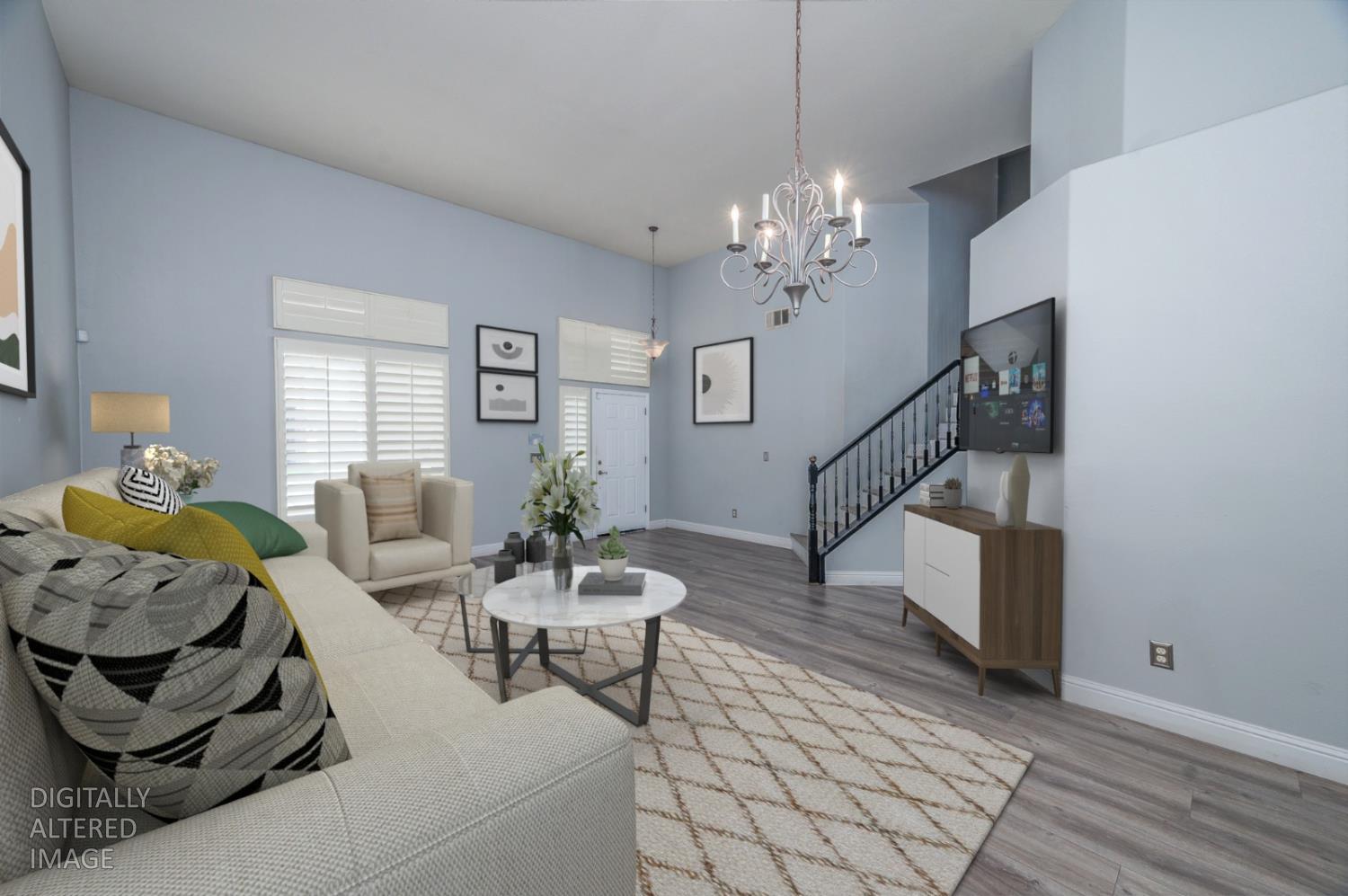 2800 Olympus Court Modesto, CA 95356 - Photo 27 of 56 a living room with furniture and wooden floor