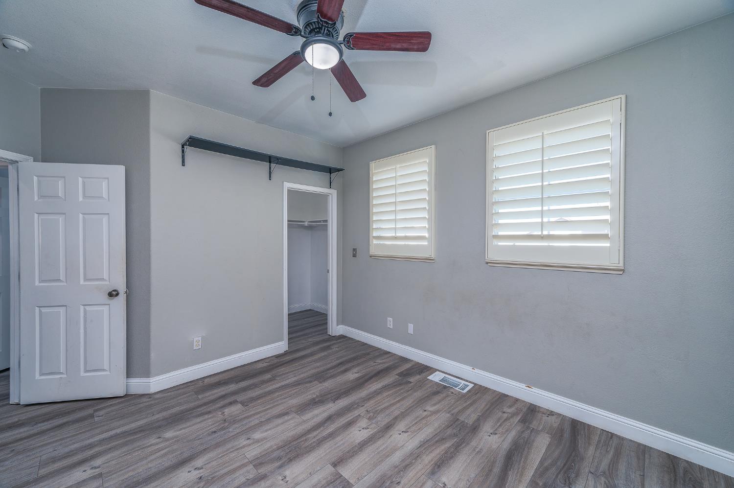 2800 Olympus Court Modesto, CA 95356 - Photo 30 of 56 wooden floor in an empty room with a window