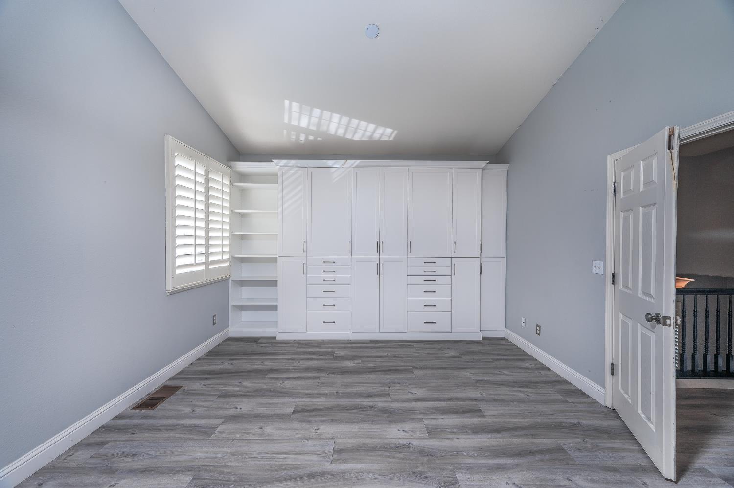 2800 Olympus Court Modesto, CA 95356 - Photo 39 of 56 wooden floor in an empty room with a window