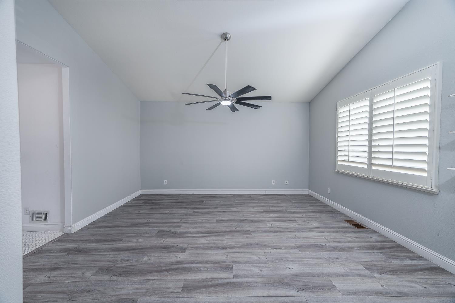 2800 Olympus Court Modesto, CA 95356 - Photo 41 of 56 a view of a room with wooden floor and window