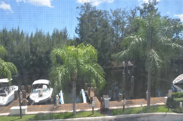 a view of swimming pool with a table and chairs