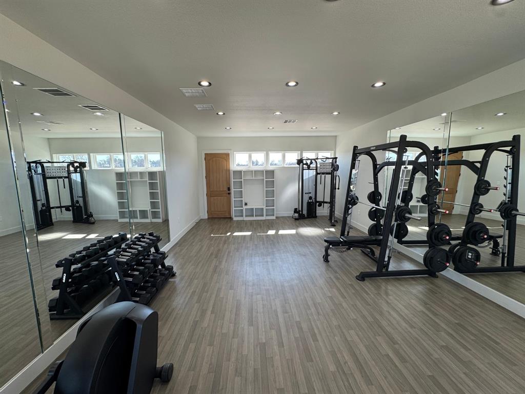 533 Timberland Heights Windom, TX 75492 - Photo 21 of 35 a view of a room with gym equipment