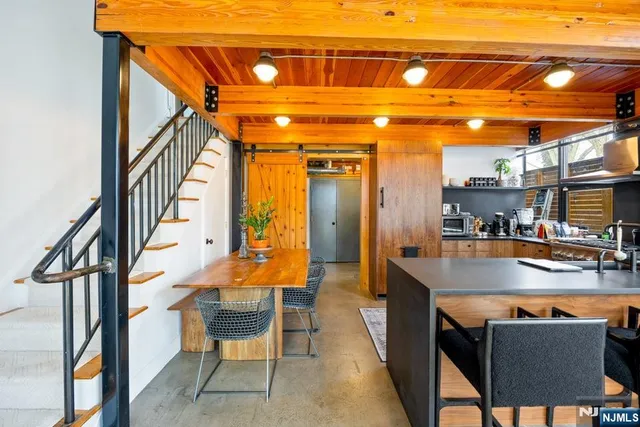 a view of a chairs and table in a patio