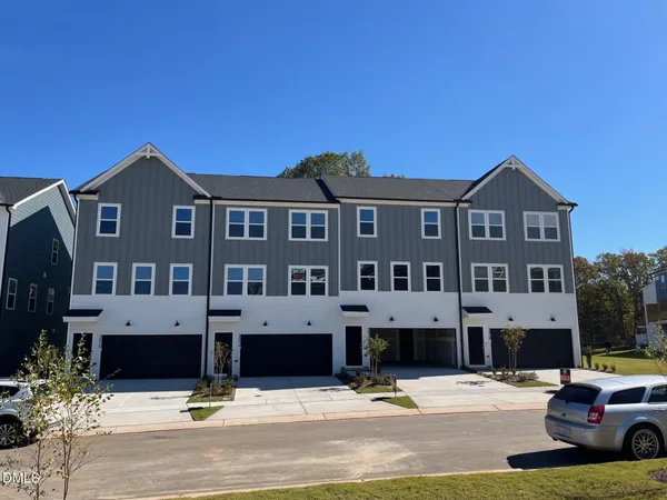 a front view of a building with street view