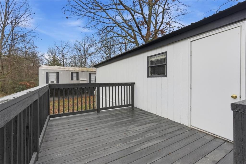 129 Rising Fawn Trail Northeast Rome, GA 30165 - Photo 23 of 28 a view of a wooden deck
