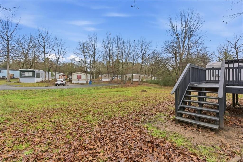 129 Rising Fawn Trail Northeast Rome, GA 30165 - Photo 24 of 28 a view of a park with large trees