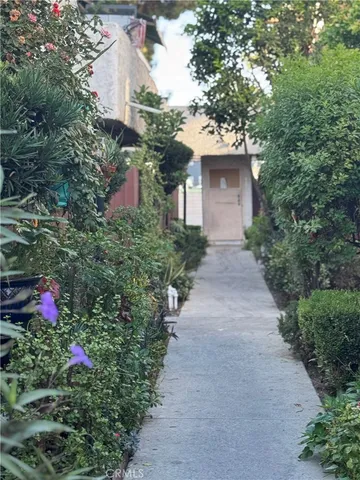 a front view of a house with yard