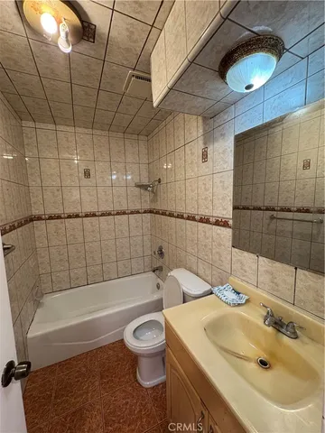 a bathroom with a sink and bathtub