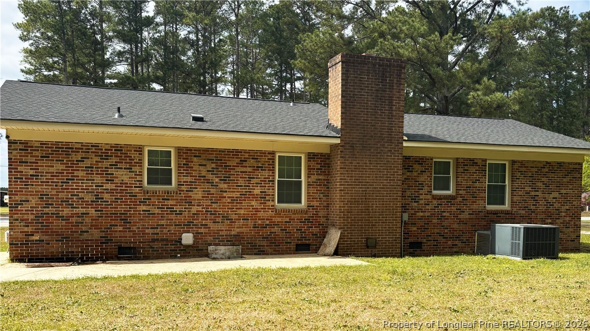 2112 Doc Brown Road Raeford, NC 28376 - Photo 3 of 19 a view of a house with a yard