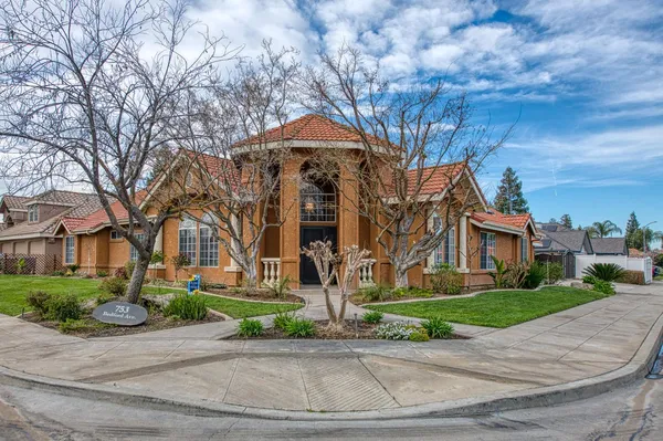 front view of house with a yard