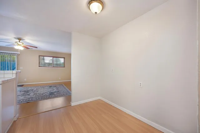 a kitchen with a refrigerator sink and stove