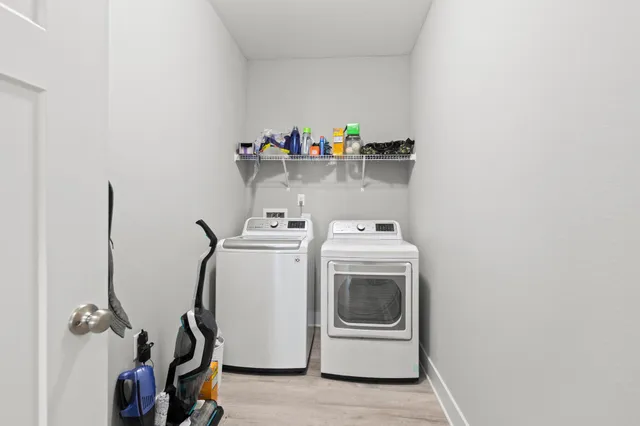 a utility room with dryer and washer