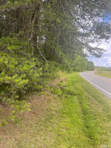a view of a yard with an trees