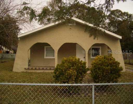 3411 West Chestnut Street Tampa, FL 33607 - Photo 1 of 1 a front view of a house with garden