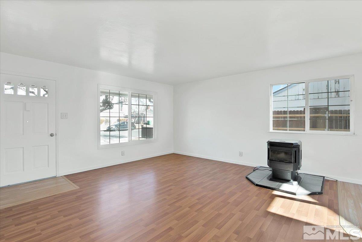1630 Dayton Way Reno, NV 89502 - Photo 17 of 36 a view of a livingroom with wooden floor and a window