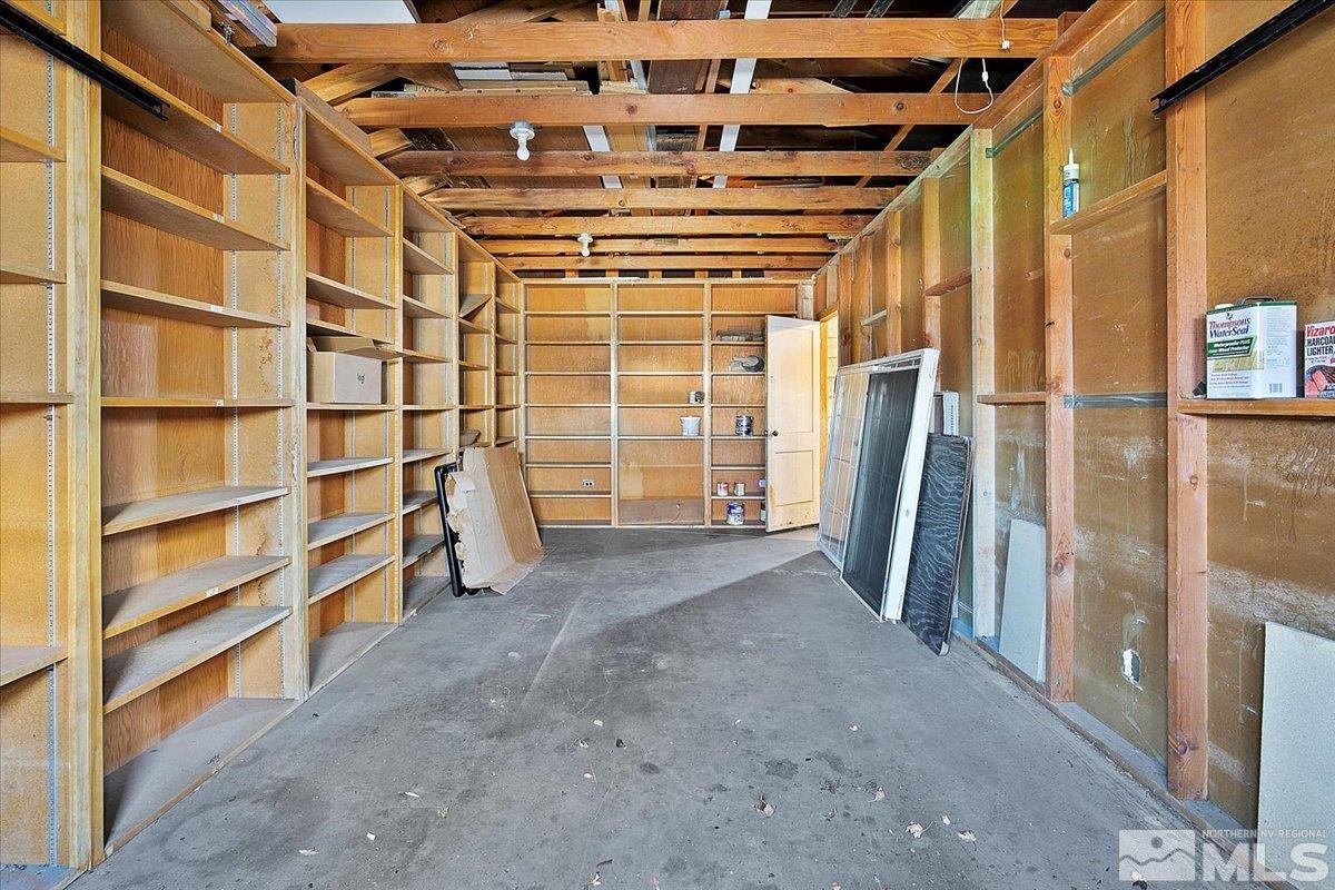 1630 Dayton Way Reno, NV 89502 - Photo 26 of 36 a view of a room with wooden walls and stairs