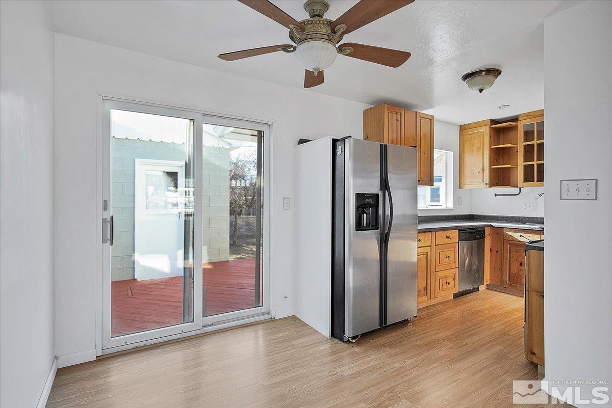 1630 Dayton Way Reno, NV 89502 - Photo 3 of 36 a view of a kitchen with refrigerator and wooden floor