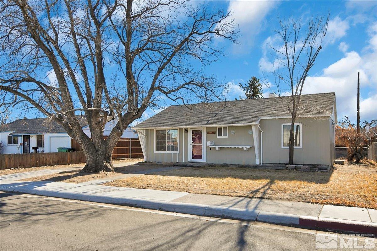 1630 Dayton Way Reno, NV 89502 - Photo 33 of 36 a house that has a tree in front of it