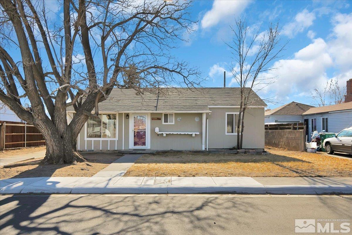 1630 Dayton Way Reno, NV 89502 - Photo 34 of 36 a front view of a house with a yard