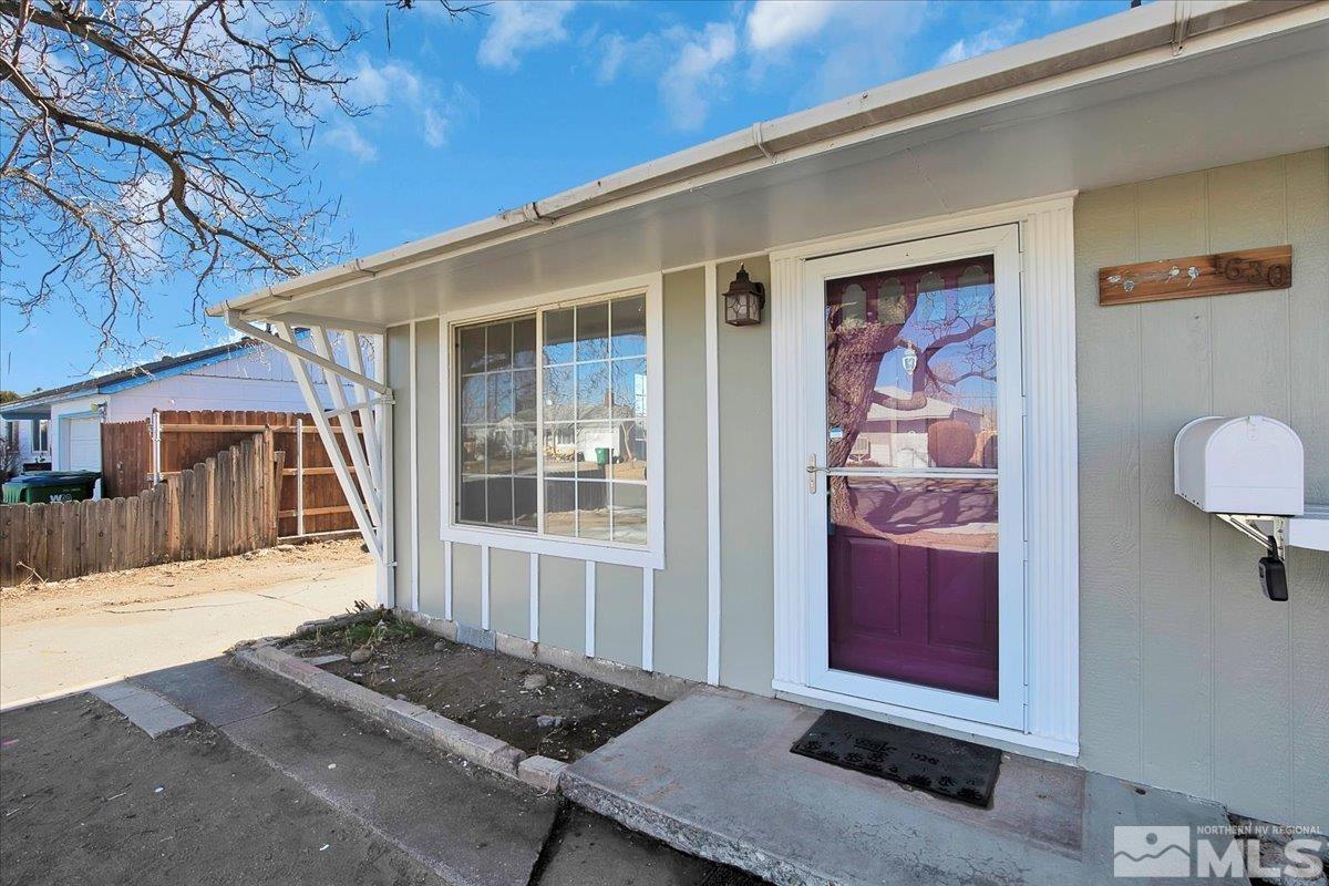 1630 Dayton Way Reno, NV 89502 - Photo 35 of 36 a front view of a house with a yard