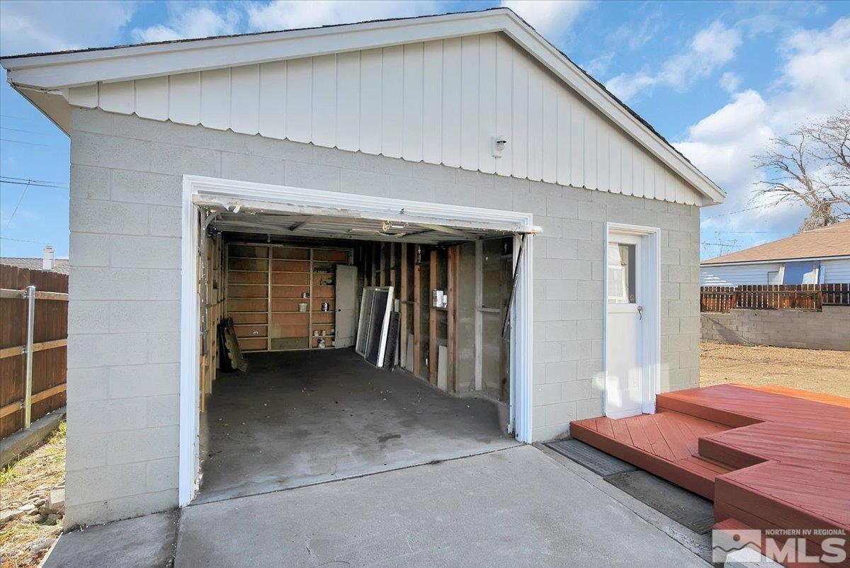 1630 Dayton Way Reno, NV 89502 - Photo 5 of 36 a view of a porch with wooden floor and fence