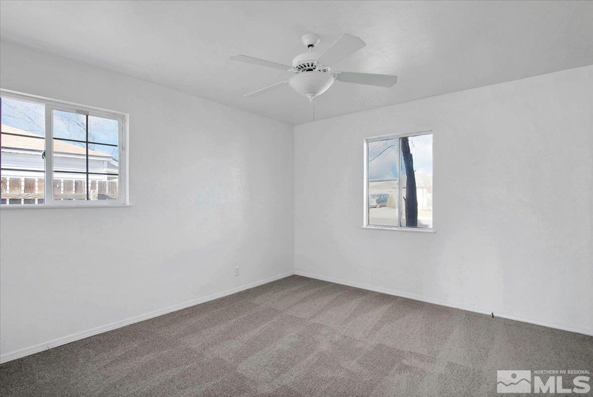 1630 Dayton Way Reno, NV 89502 - Photo 6 of 36 an empty room with a window