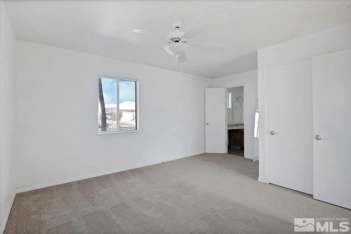 1630 Dayton Way Reno, NV 89502 - Photo 8 of 36 a view of an empty room with a window