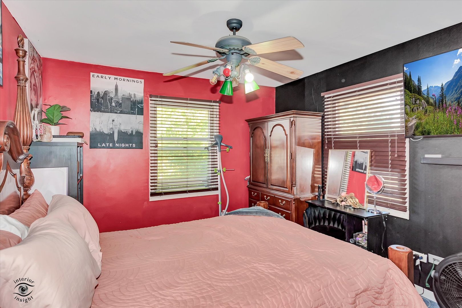 1804 Maserati Drive Joliet, IL 60435 - Photo 12 of 25 a bedroom with a bed and a flat screen tv