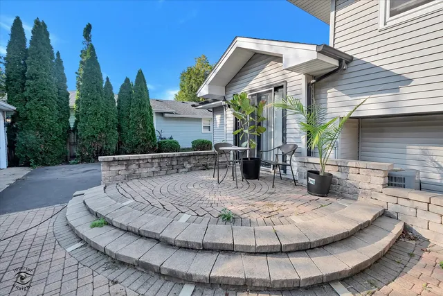 a view of a house with entertaining space