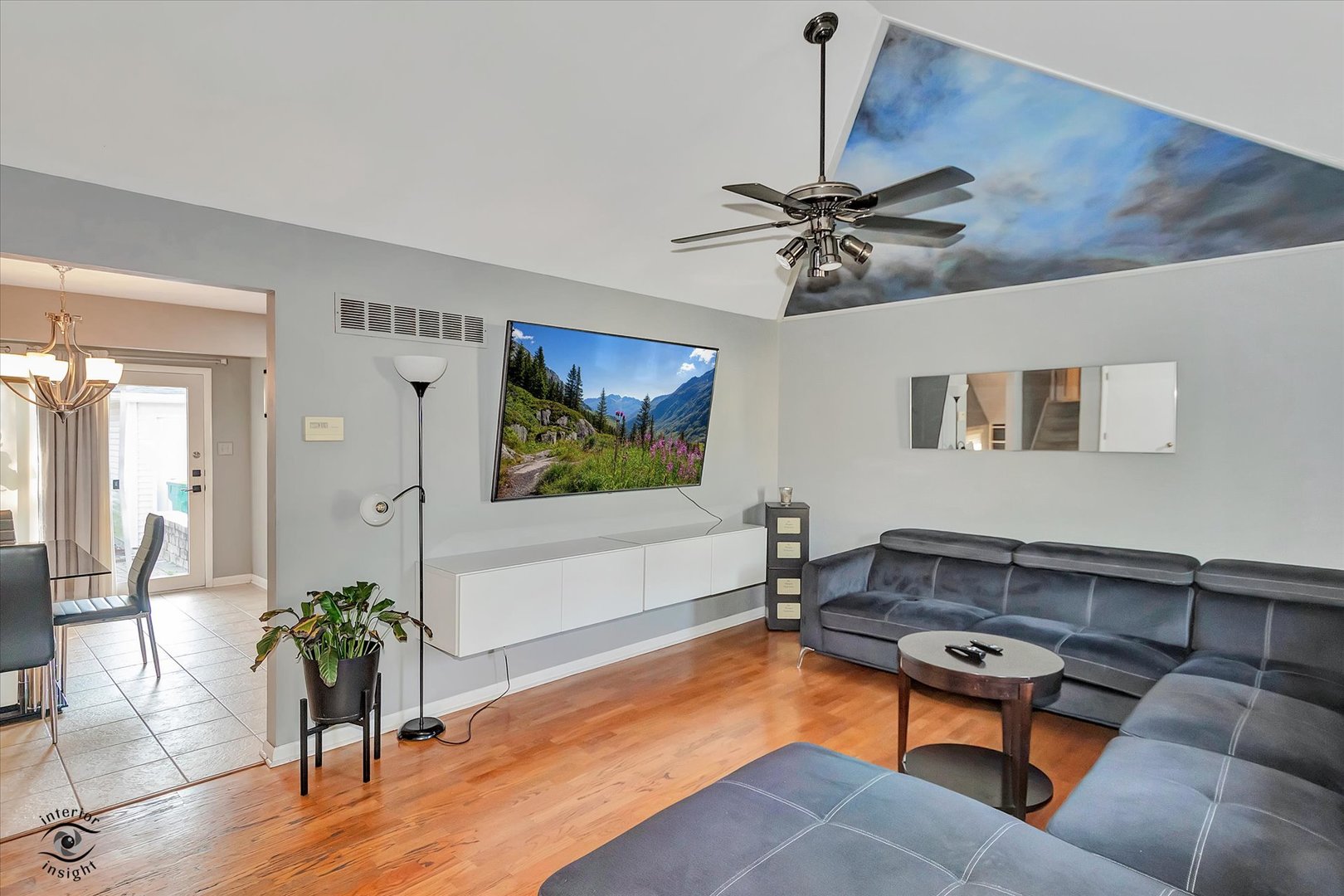 1804 Maserati Drive Joliet, IL 60435 - Photo 4 of 25 a living room with furniture and a flat screen tv
