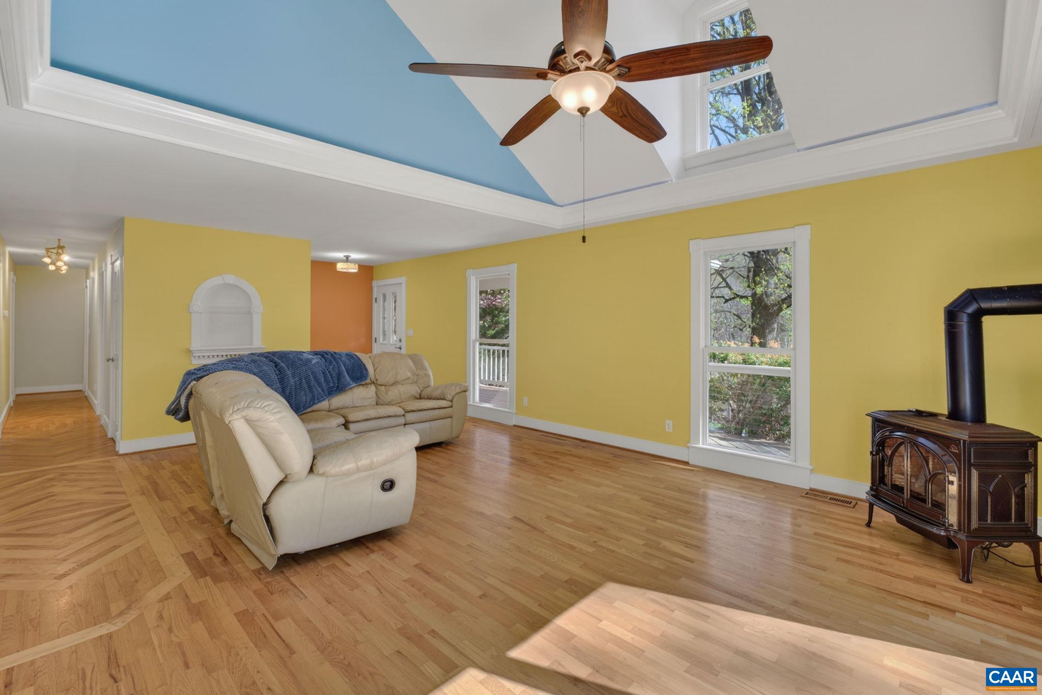 689 Mutton Hollow Road Stanardsville, VA 22973 - Photo 33 of 61 a living room with furniture and a flat screen tv