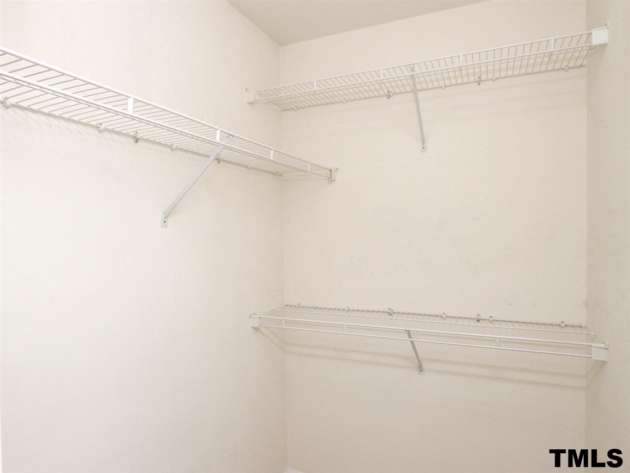 4409 Archibald Way Raleigh, NC 27616 - Photo 14 of 23 a view of a room with racks on the wall
