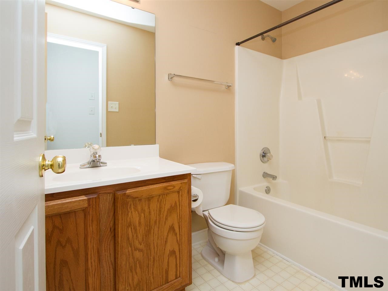 4409 Archibald Way Raleigh, NC 27616 - Photo 15 of 23 a bathroom with a sink a toilet and shower
