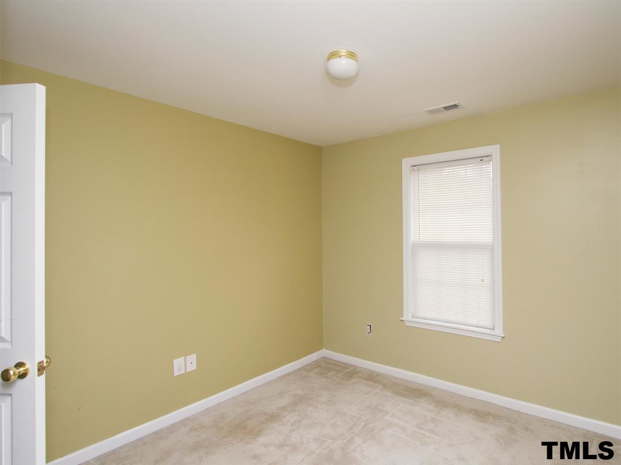 4409 Archibald Way Raleigh, NC 27616 - Photo 16 of 23 a view of a big room with windows