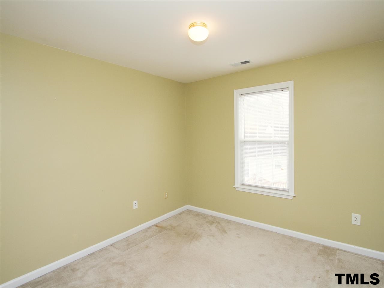 4409 Archibald Way Raleigh, NC 27616 - Photo 17 of 23 an empty room with windows