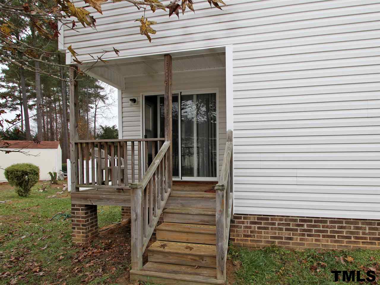 4409 Archibald Way Raleigh, NC 27616 - Photo 18 of 23 a view of a house with wooden fence