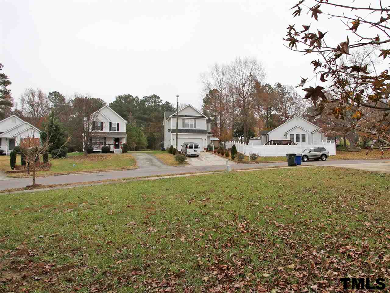 4409 Archibald Way Raleigh, NC 27616 - Photo 19 of 23 a view of a house with a yard