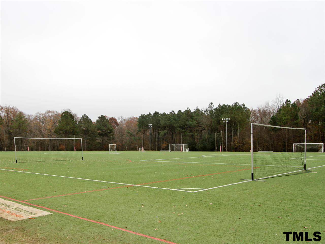 4409 Archibald Way Raleigh, NC 27616 - Photo 21 of 23 a view of a tennis court