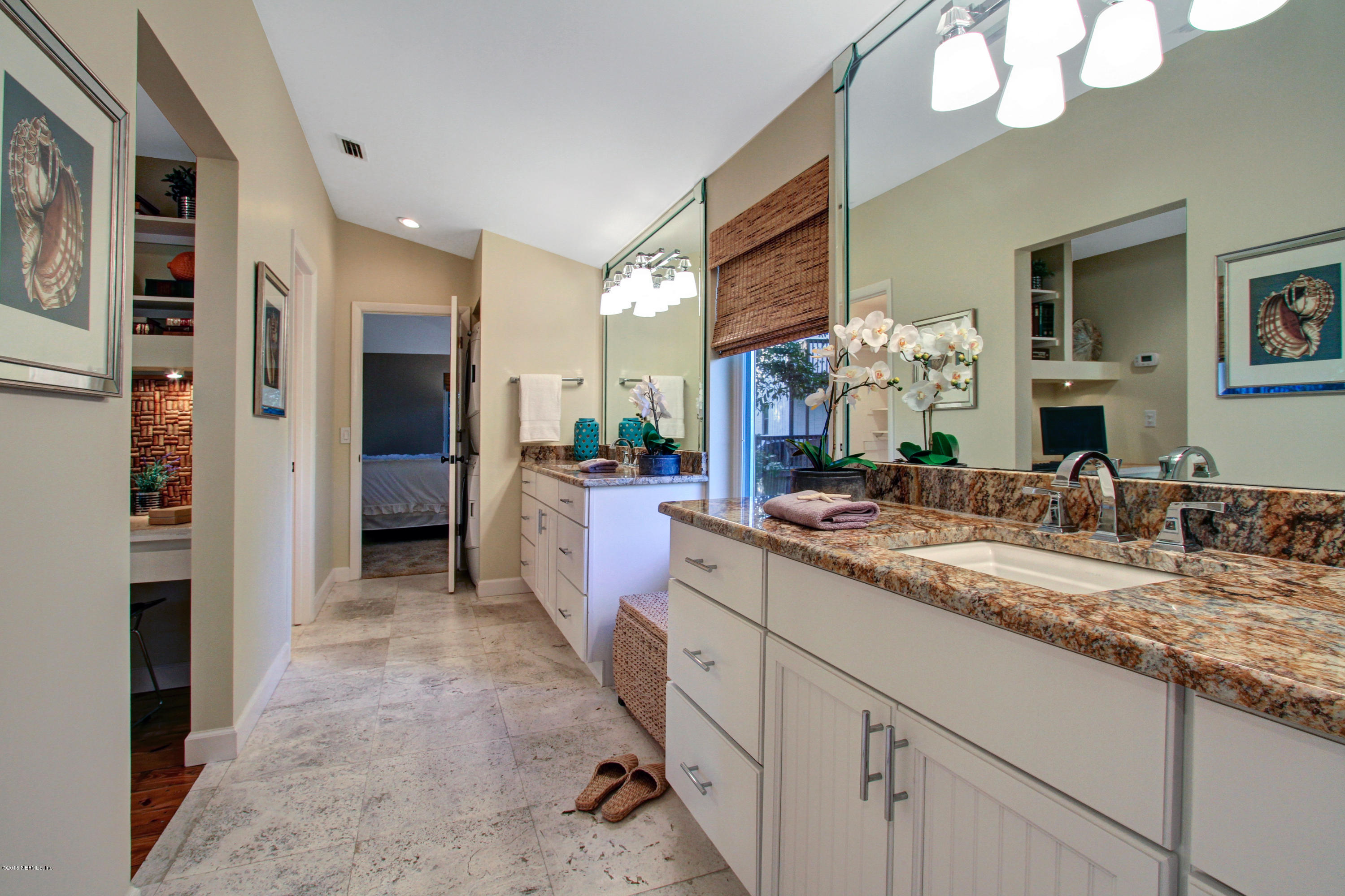 71 19th Street Atlantic Beach, FL 32233 - Photo 11 of 30 a large kitchen with granite countertop a sink and a refrigerator
