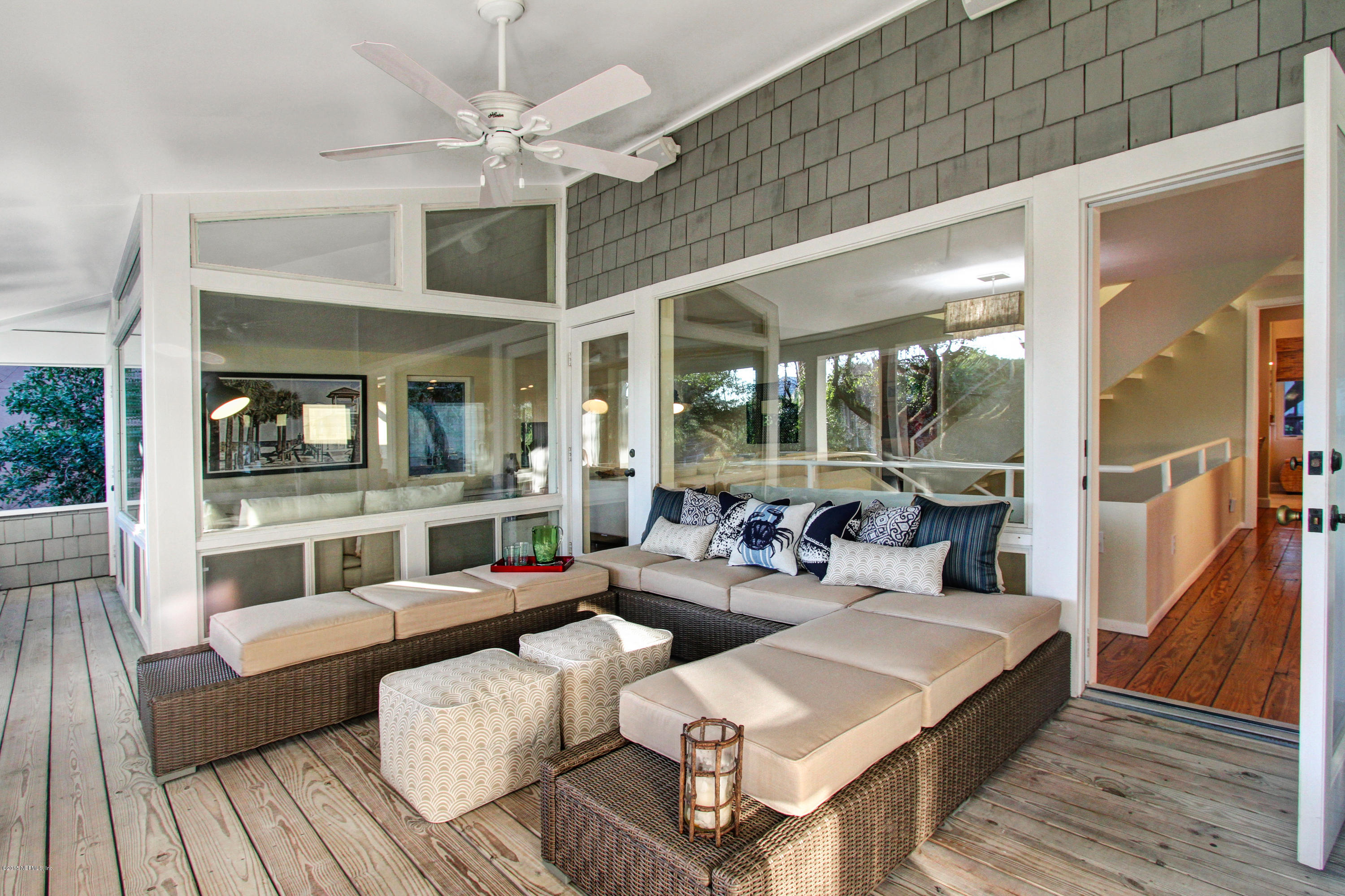 71 19th Street Atlantic Beach, FL 32233 - Photo 19 of 30 a living room with furniture and a large window