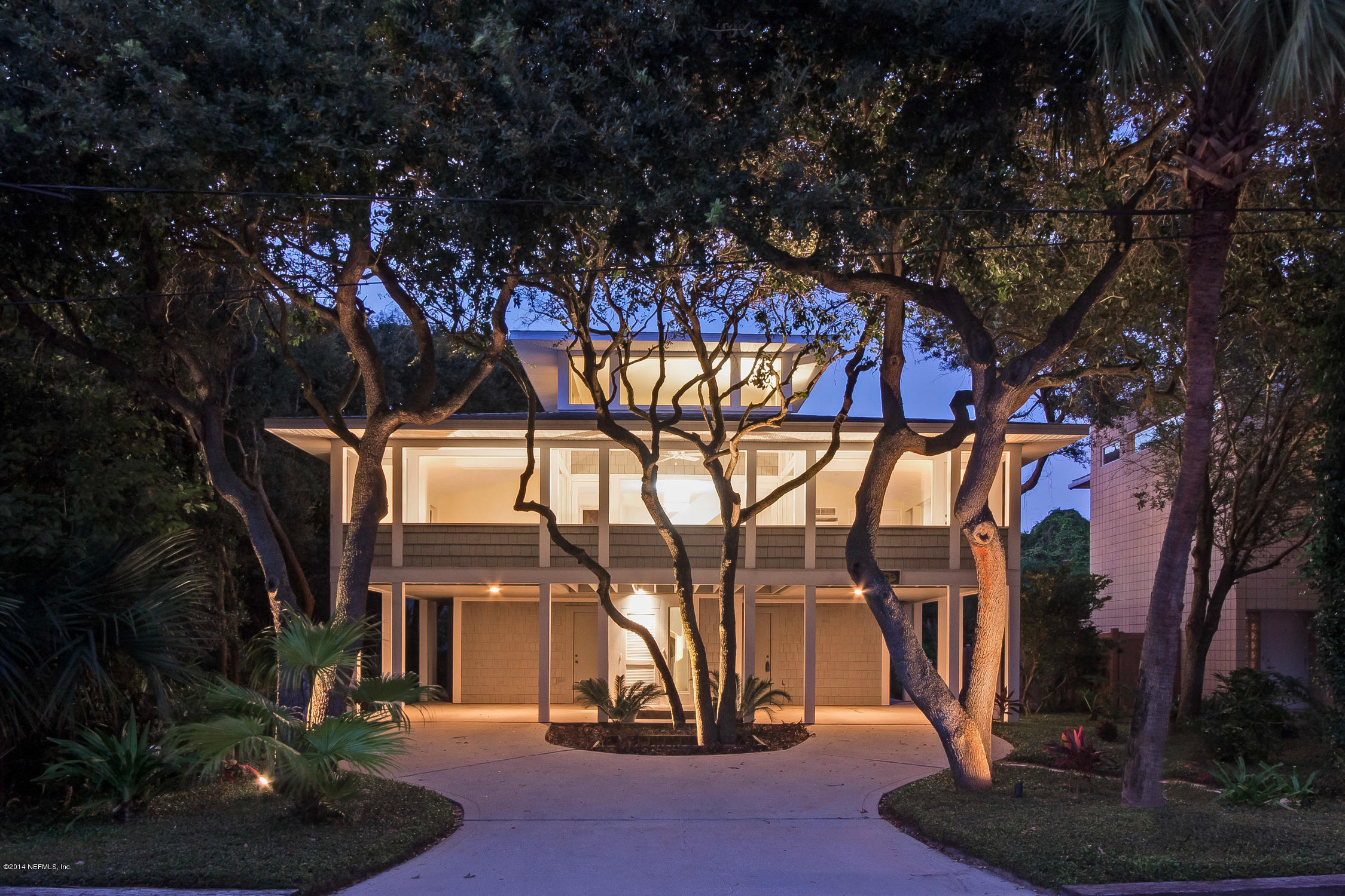 71 19th Street Atlantic Beach, FL 32233 - Photo 2 of 30 a view of a building with a tree