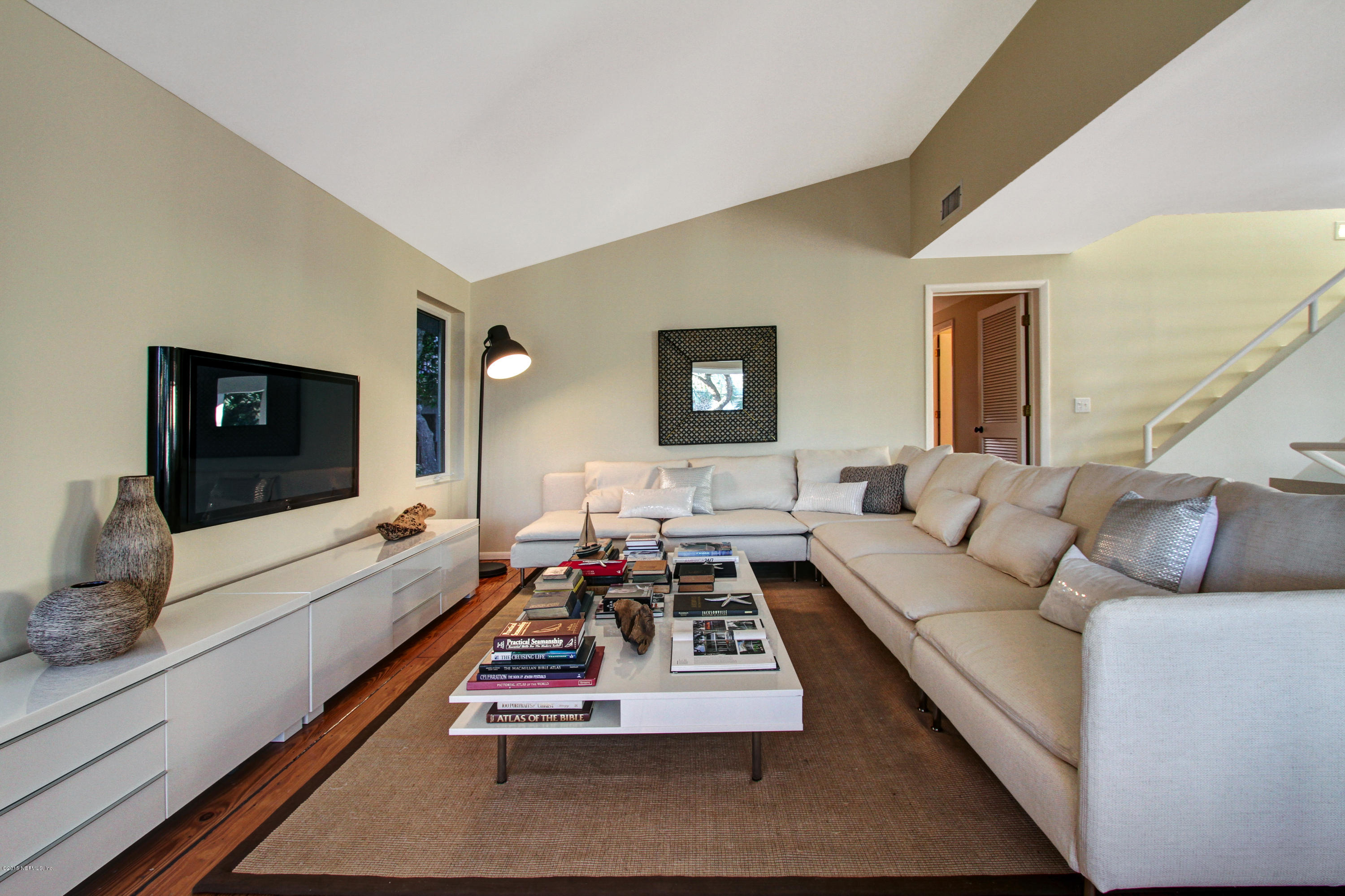 71 19th Street Atlantic Beach, FL 32233 - Photo 7 of 30 a living room with furniture and a flat screen tv