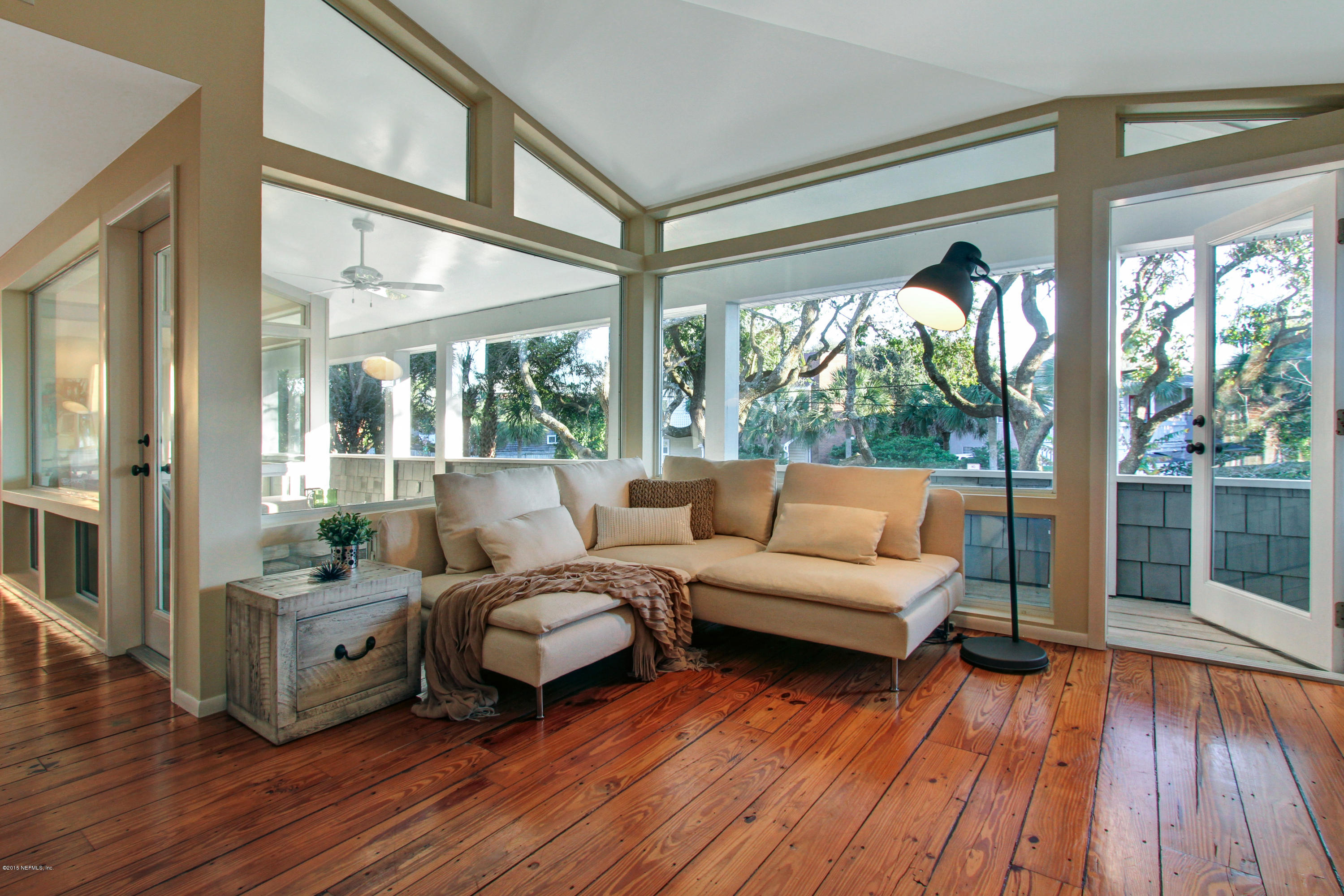 71 19th Street Atlantic Beach, FL 32233 - Photo 8 of 30 a living room with furniture and a large window