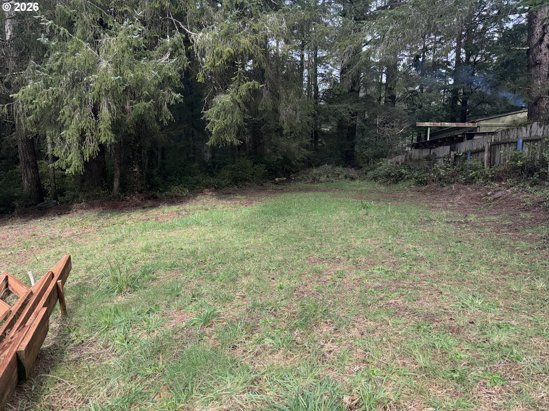 4923 Mitchell Loop Road Florence, OR 97439 - Photo 16 of 22 a view of backyard with furniture