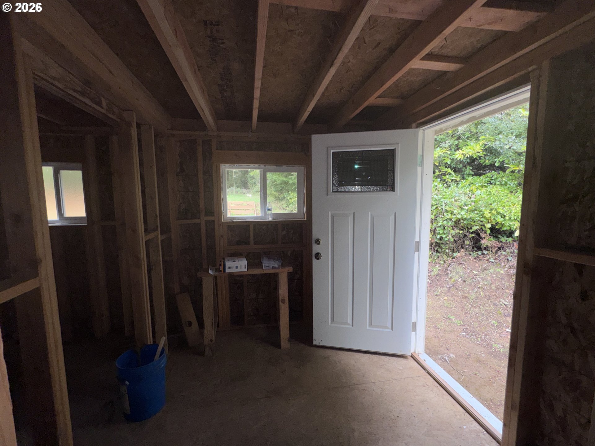 4923 Mitchell Loop Road Florence, OR 97439 - Photo 6 of 22 a view of hallway with furniture and a window