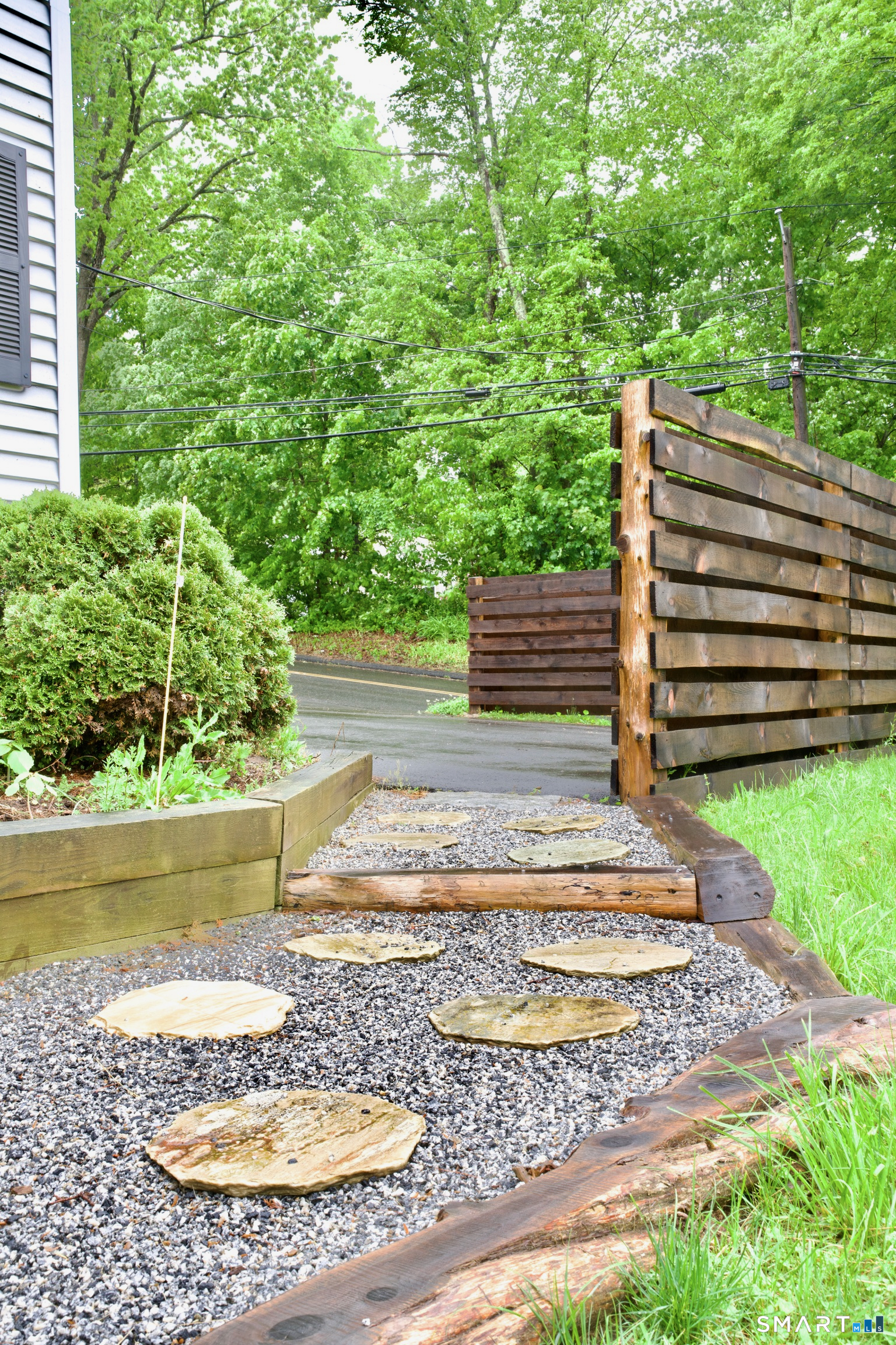 259 Peck Hill Road Woodbridge, CT 06525 - Photo 5 of 32 a view of a yard with an outdoor space