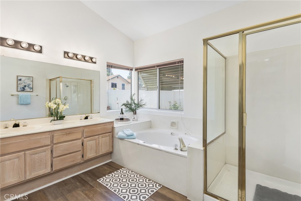 8742 Feathertop Road Riverside, CA 92508 - Photo 29 of 40 Main bathroom, ensuite. Double sink, bathtub, shower is separate! Brand new hard flooring!