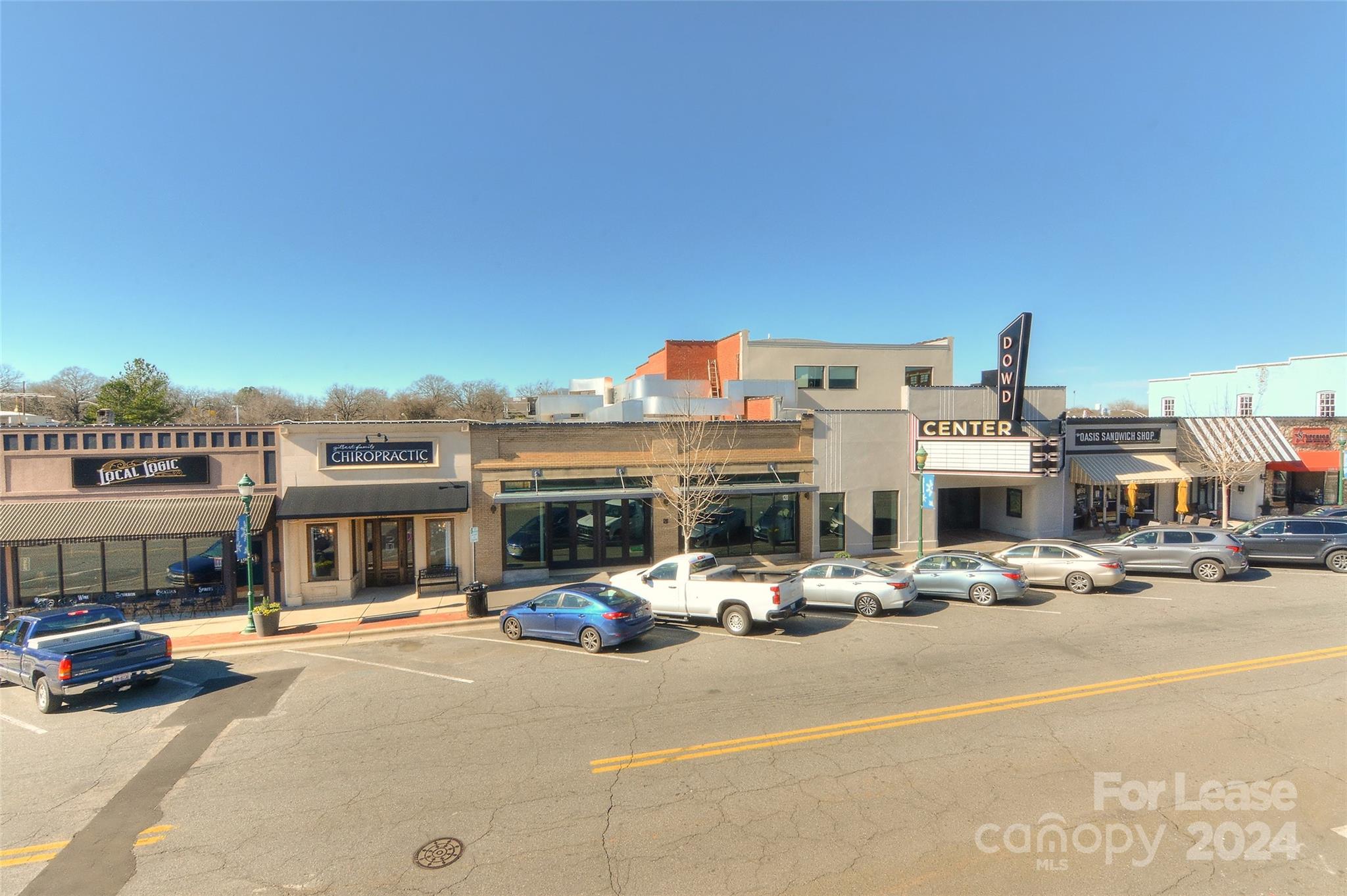 115 South Main Street, Unit 202 Monroe, NC 28112 - Photo 24 of 25 a view of a street with cars